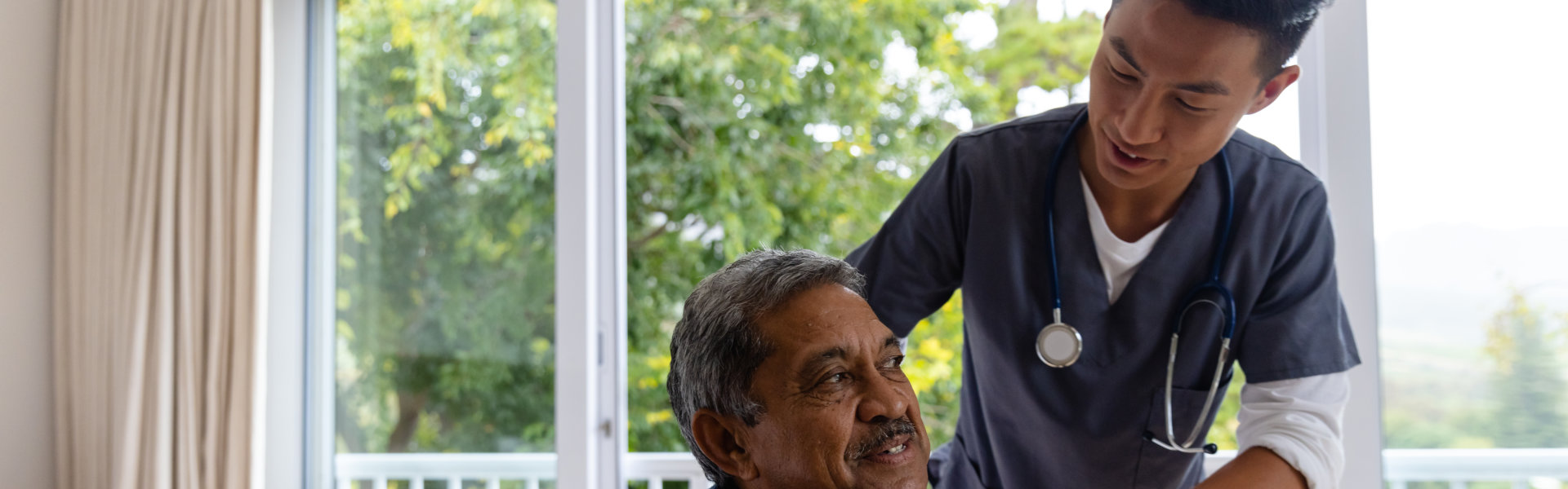 man helping senior